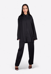 Model wearing long sleeve black shirt, East Vibe